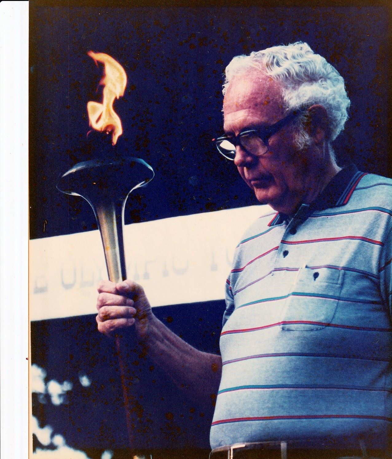 Bert Huffman carrying Olympic Torch